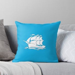 Baby blue throw white boat pillow